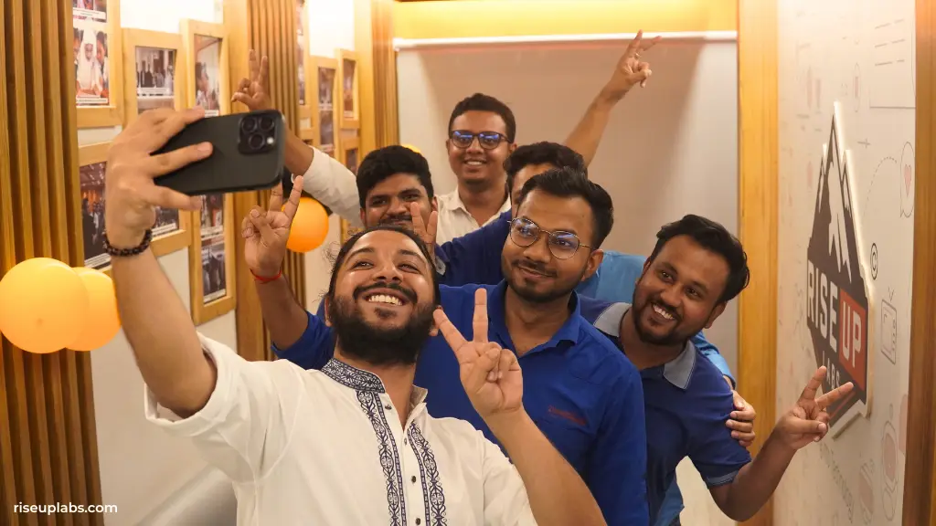 Colleagues taking photos at Color Day Celebration