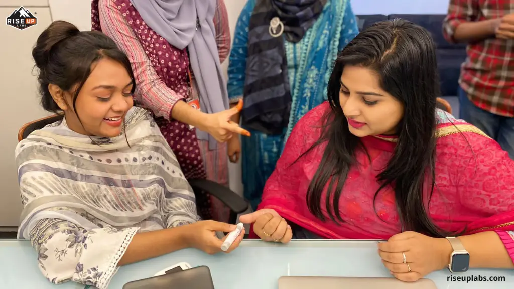 Riseup Labs' Senior HR Generalist Taslima Binta Hafiz doing her Diabetes Screening Test