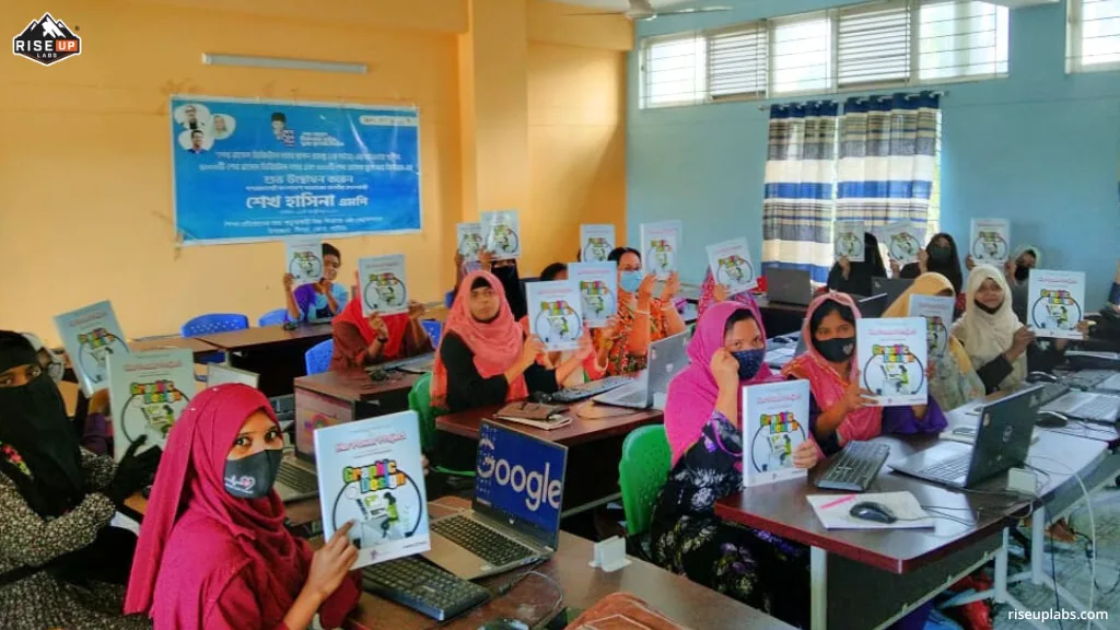 Graphic Design Trainee with their Her Power Project Training Materials