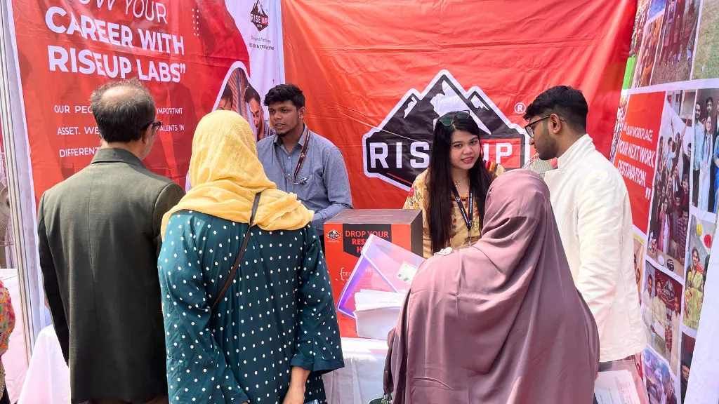 Image of Riseup Labs Team Members Providing Job Information